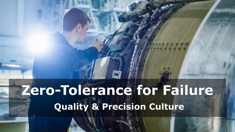 An engineer meticulously working on an aircraft fuselage, highlighting the precision required in aerospace manufacturing.