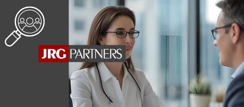 A consultant from retained executive search firm JRG Partners meets with a senior executive candidate.
