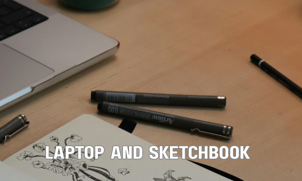 Laptop And Sketchbook