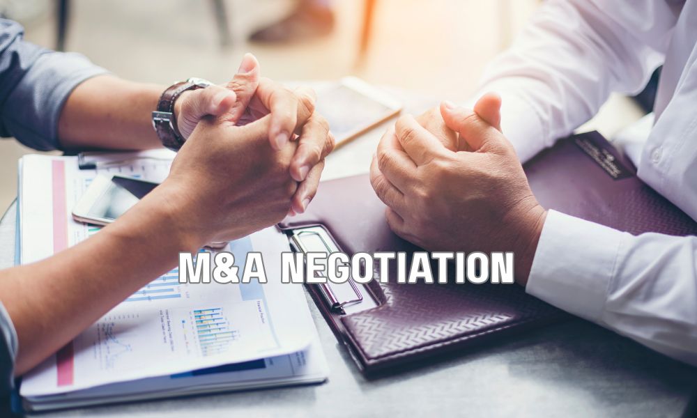 Corporate leaders discussing executive hiring strategies before completing a business acquisition.