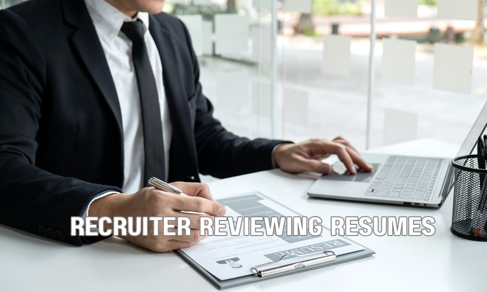 Recruiter Reviewing Resumes