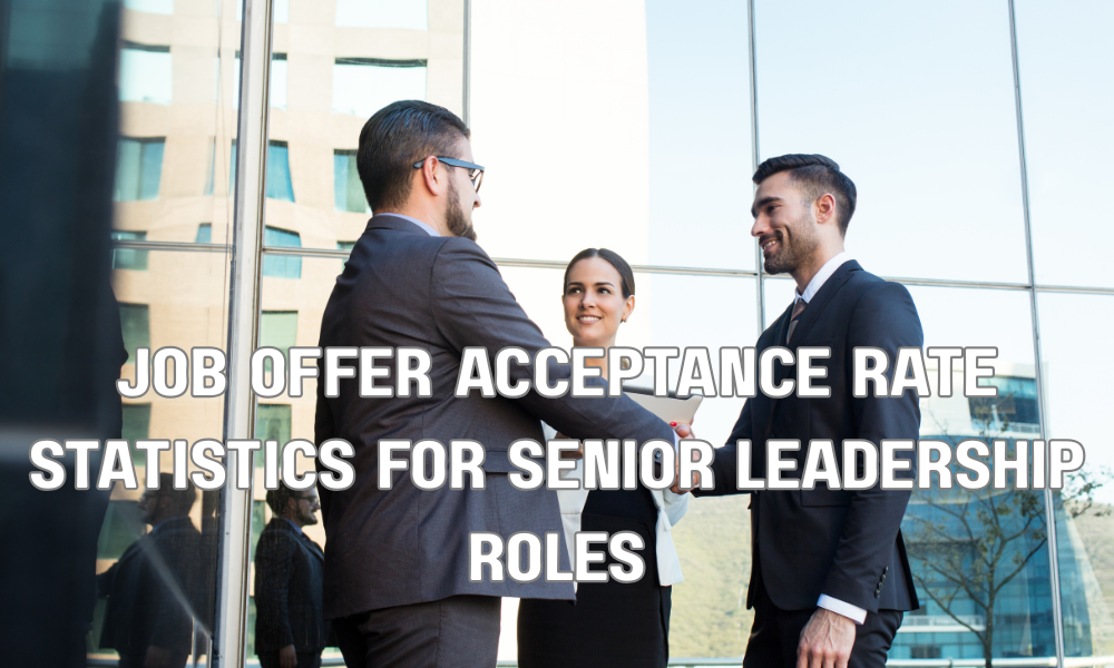Senior business executives shaking hands after reaching a job offer agreement in a corporate office.