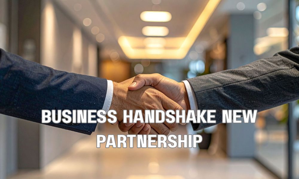 Company executives finalizing a new executive search partnership during an ongoing leadership recruitment process.