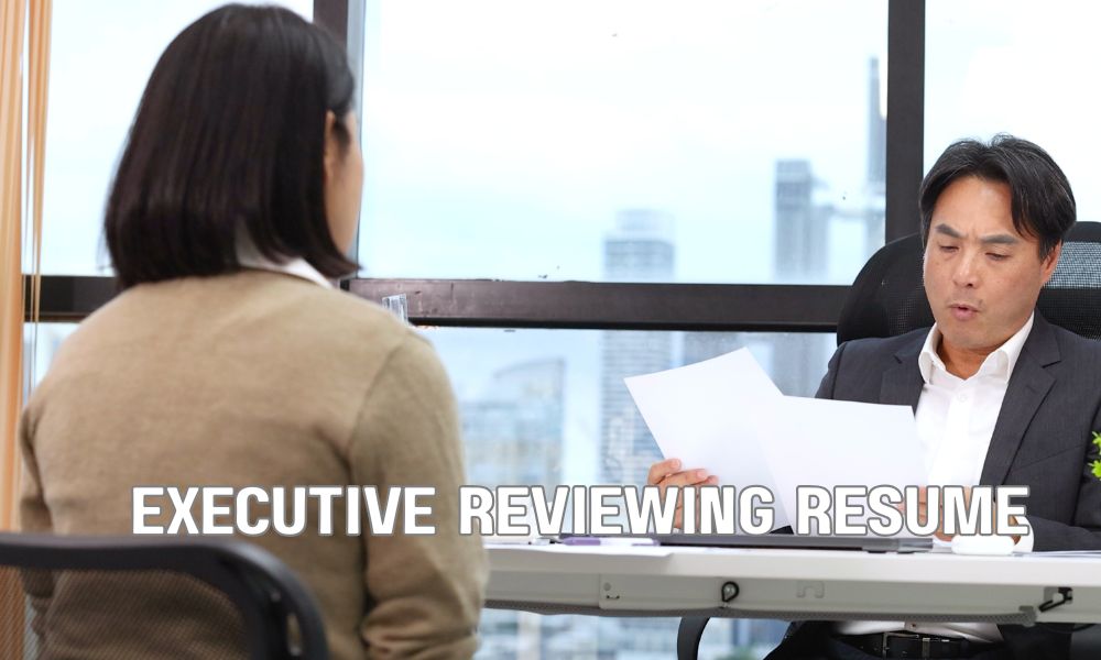 Executive Reviewing Resume