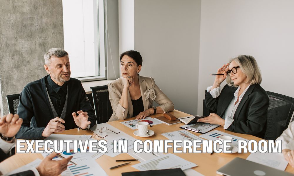 Executives In Conference Room