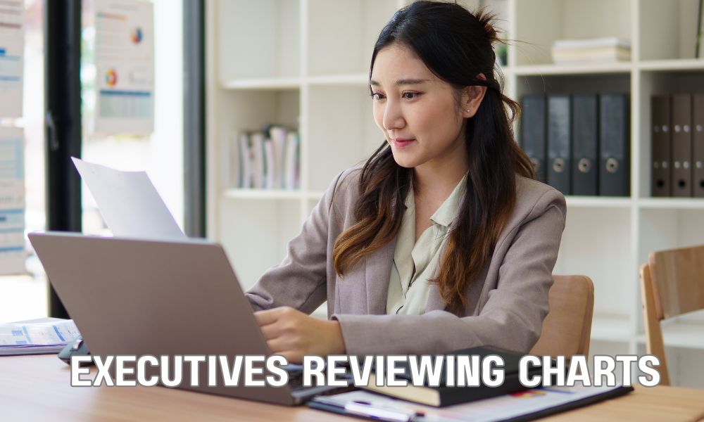 Executives Reviewing Charts