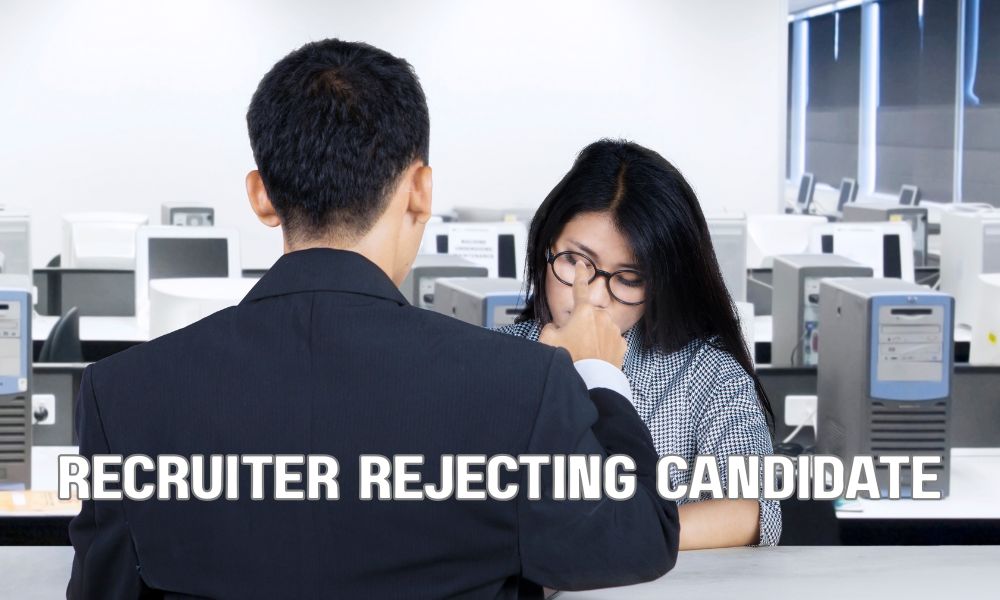 HR professional screening job applications and making a hiring decision during the recruitment process.