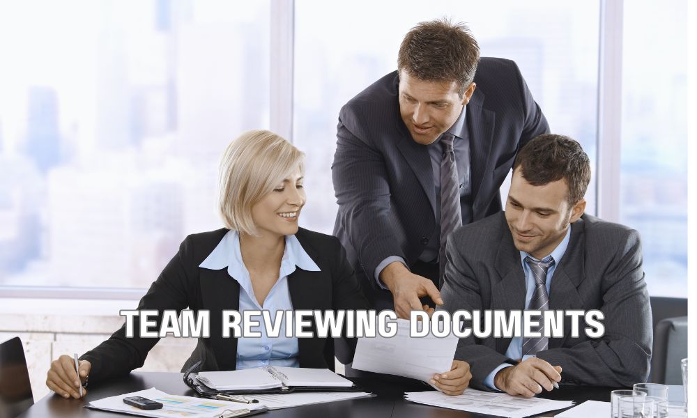 Team Reviewing Documents